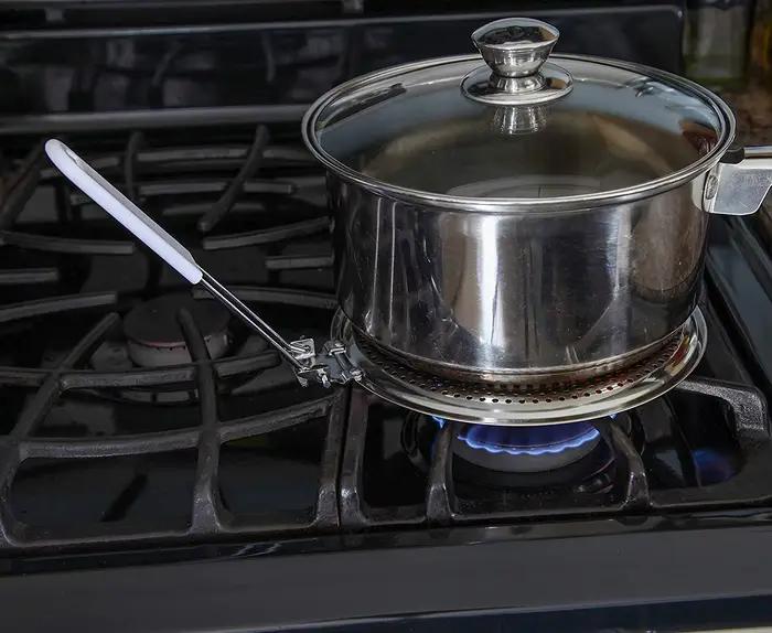 Convertisseur de plaque de cuisson à induction pour cuisinières modernes, adaptateur à induction, plaque de conduction thermique, acier inoxydable durable, design contemporain, utilisation avec casseroles traditionnelles
