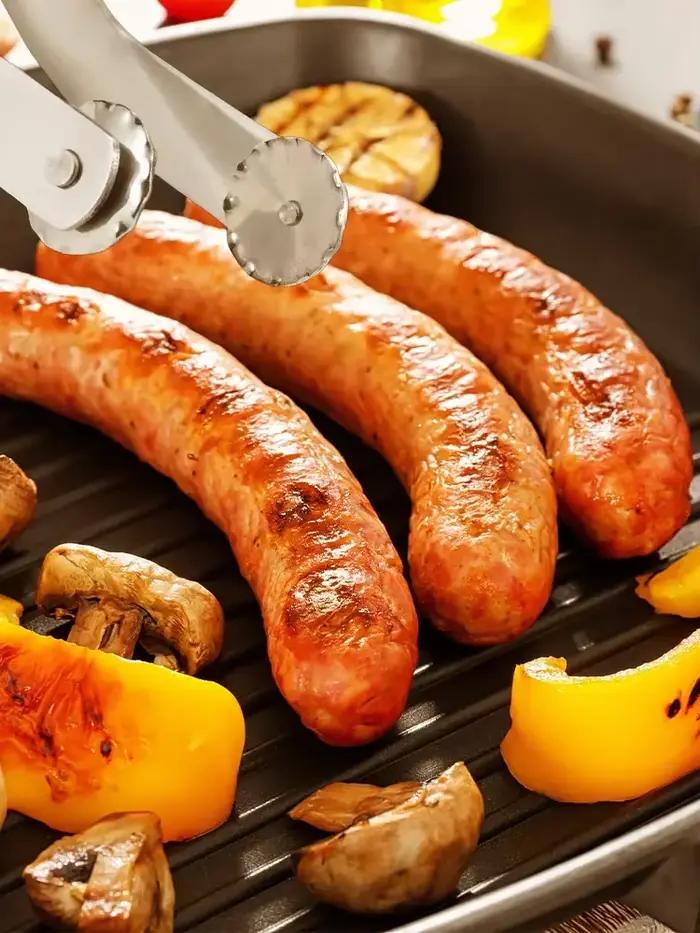 Pince tournante pour saucisses au barbecue